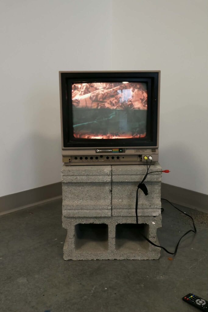 AN AVERAGE DAY
Video project, a 15 minute video detailing An Average Day played on a commodore 1702 monitor displayed on cinder blocks. Remote in front.