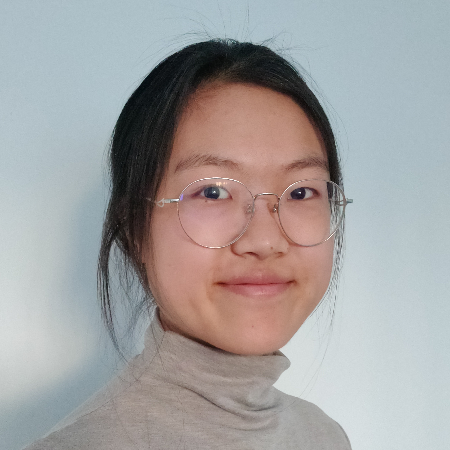 Photograph of a young Asian woman smiling at the camera.